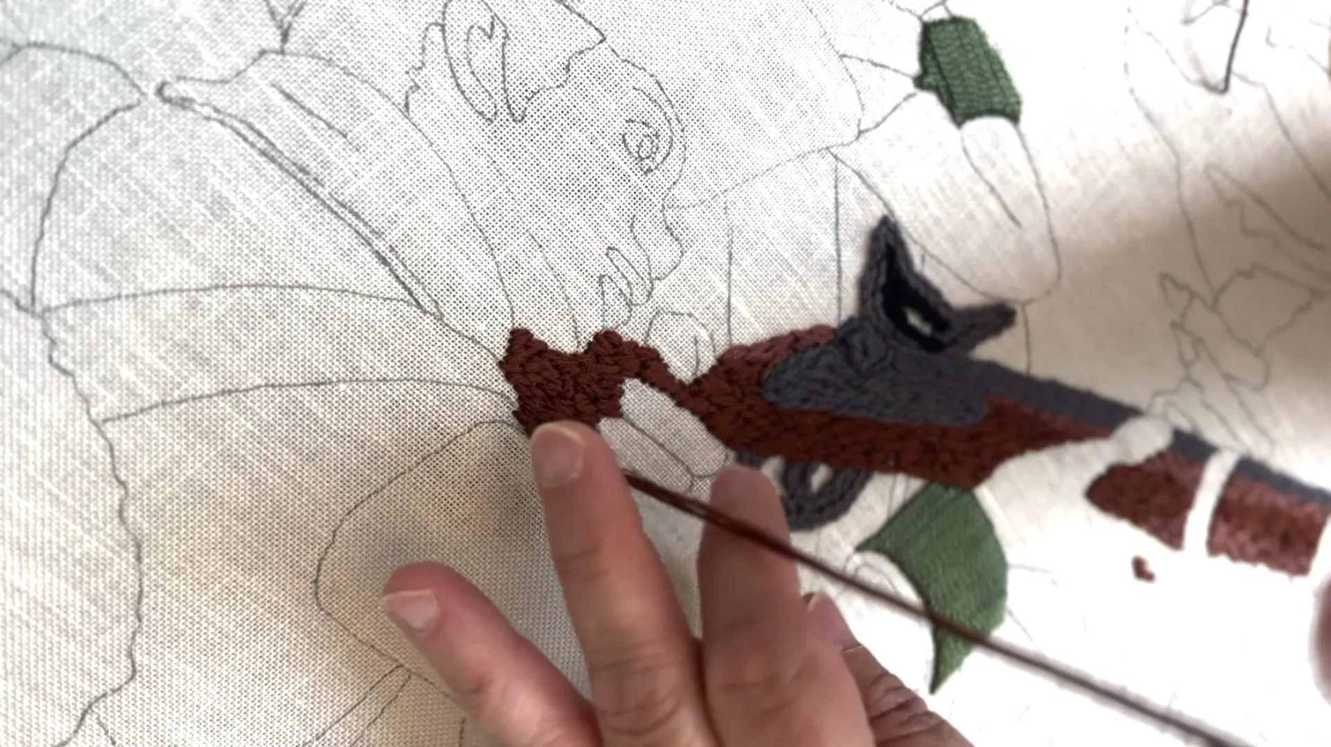 Stitchers at work on America's Tapestry