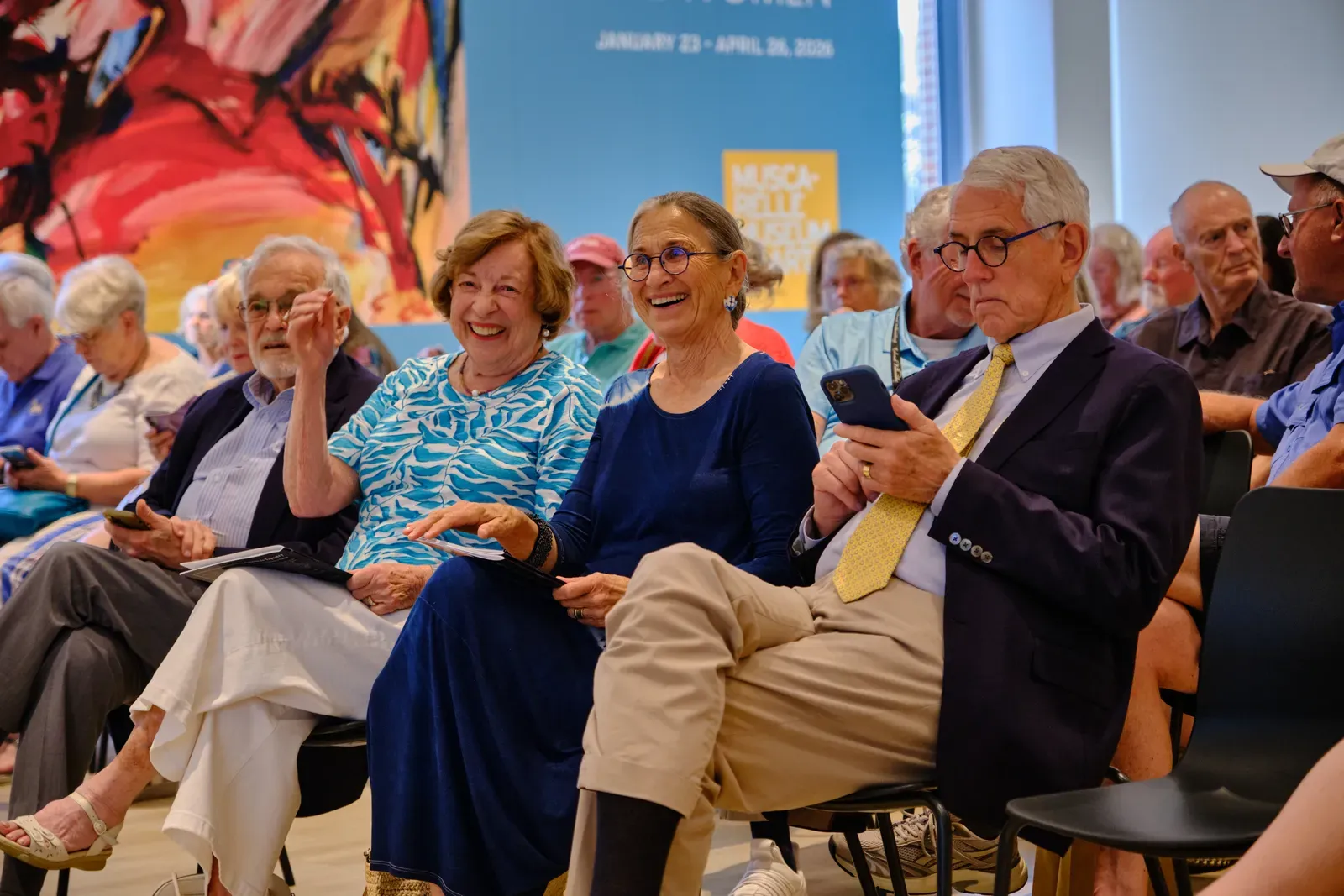 Guests gather for a talk during the opening weekend