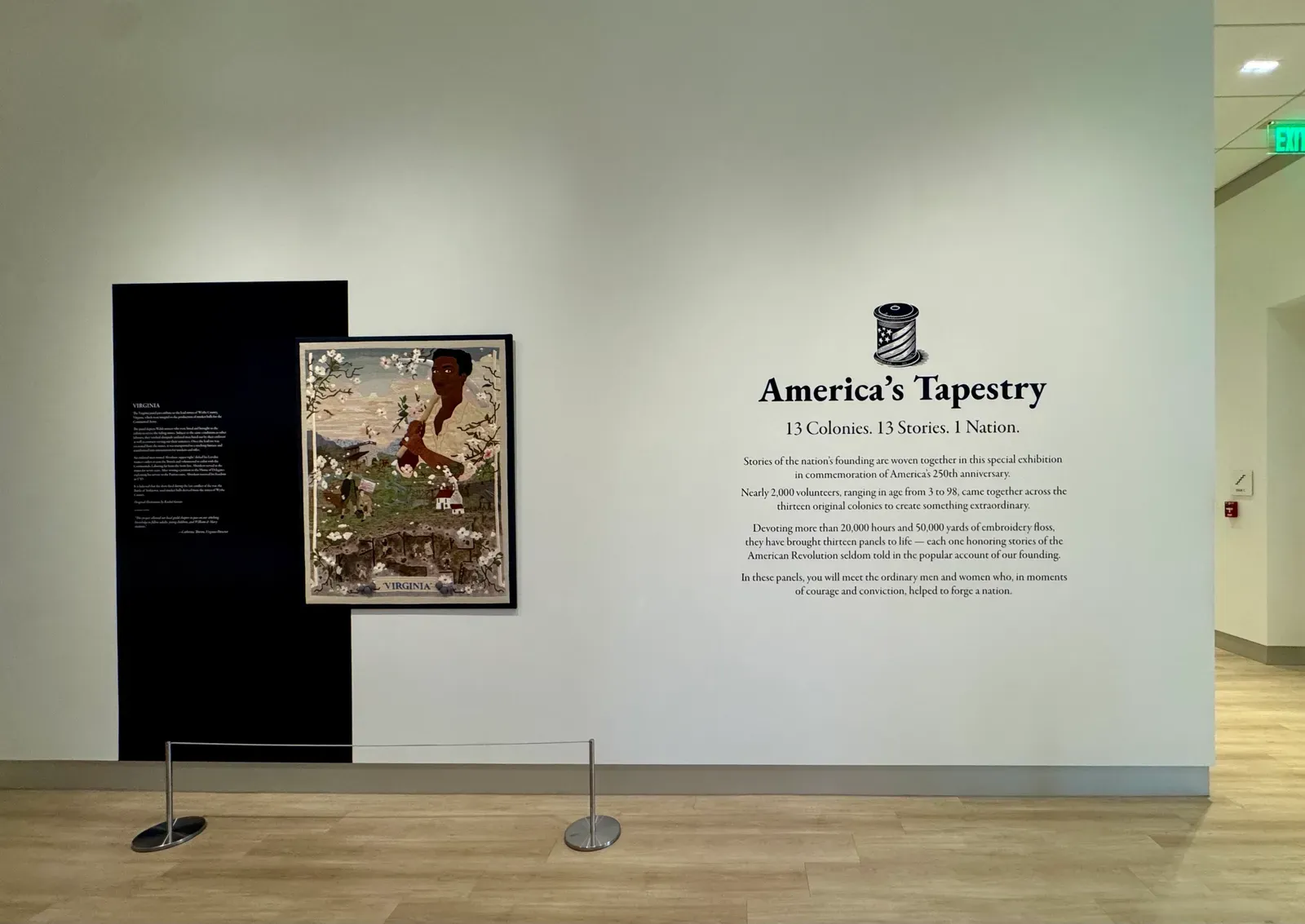 The exhibition's opening wall — America's Tapestry: 13 Colonies. 13 Stories. 1 Nation.