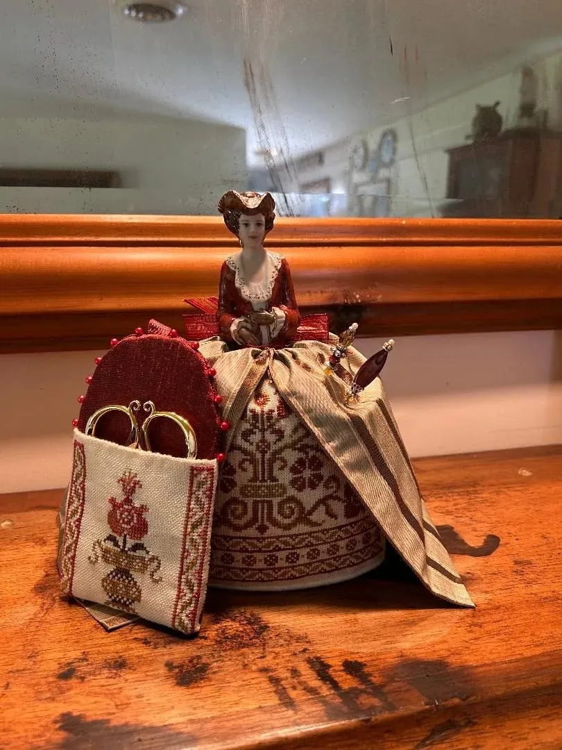 An embroidered object by Anne Hart-Davies