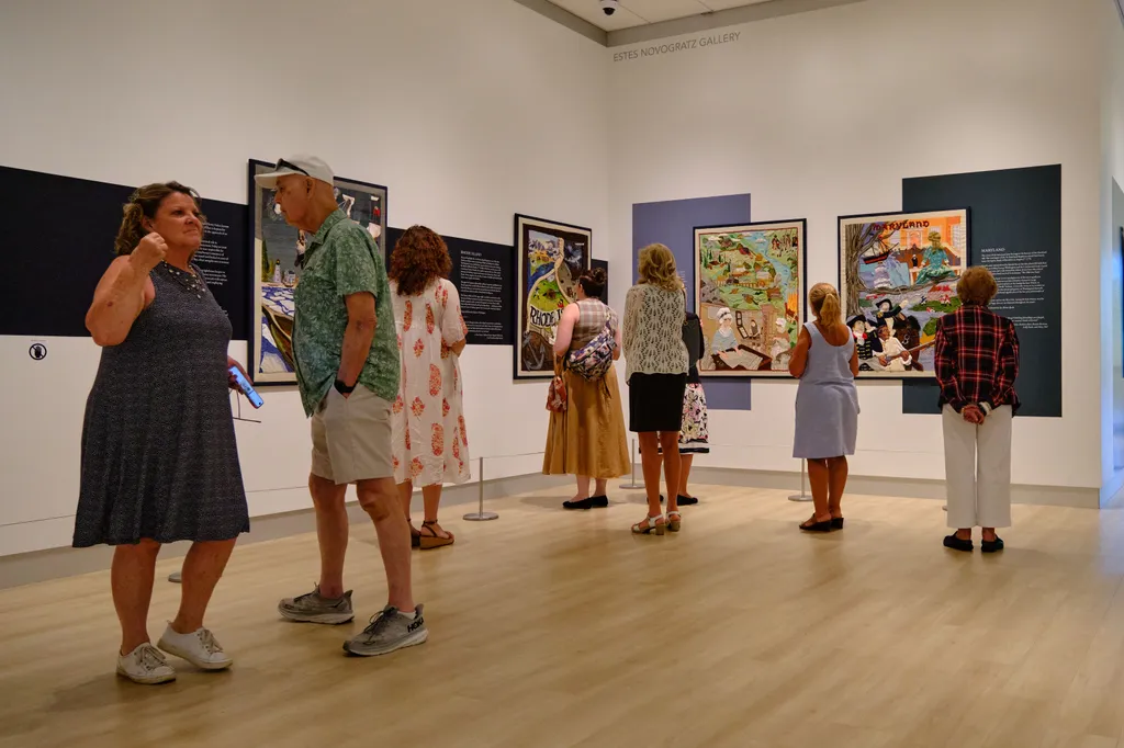 Visitors take in the Rhode Island and Maryland panels at the Muscarelle Museum of Art