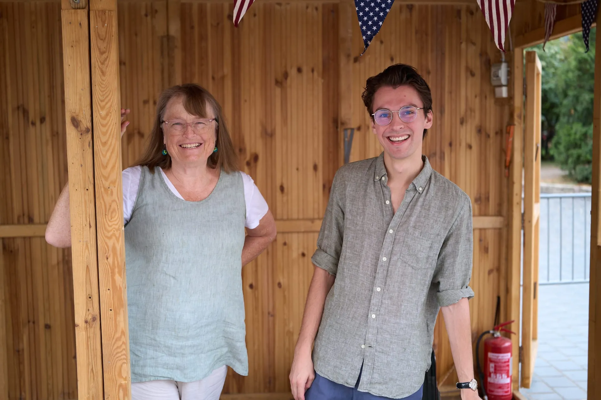 Two visitors at the America's Tapestry booth