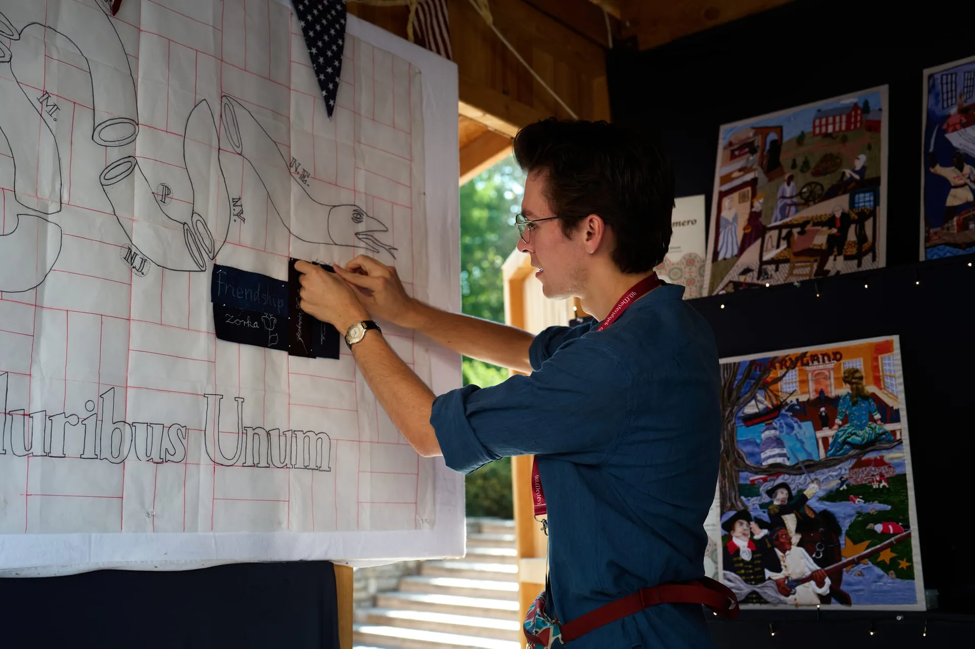 Stitching the commemorative panel at Buda Castle