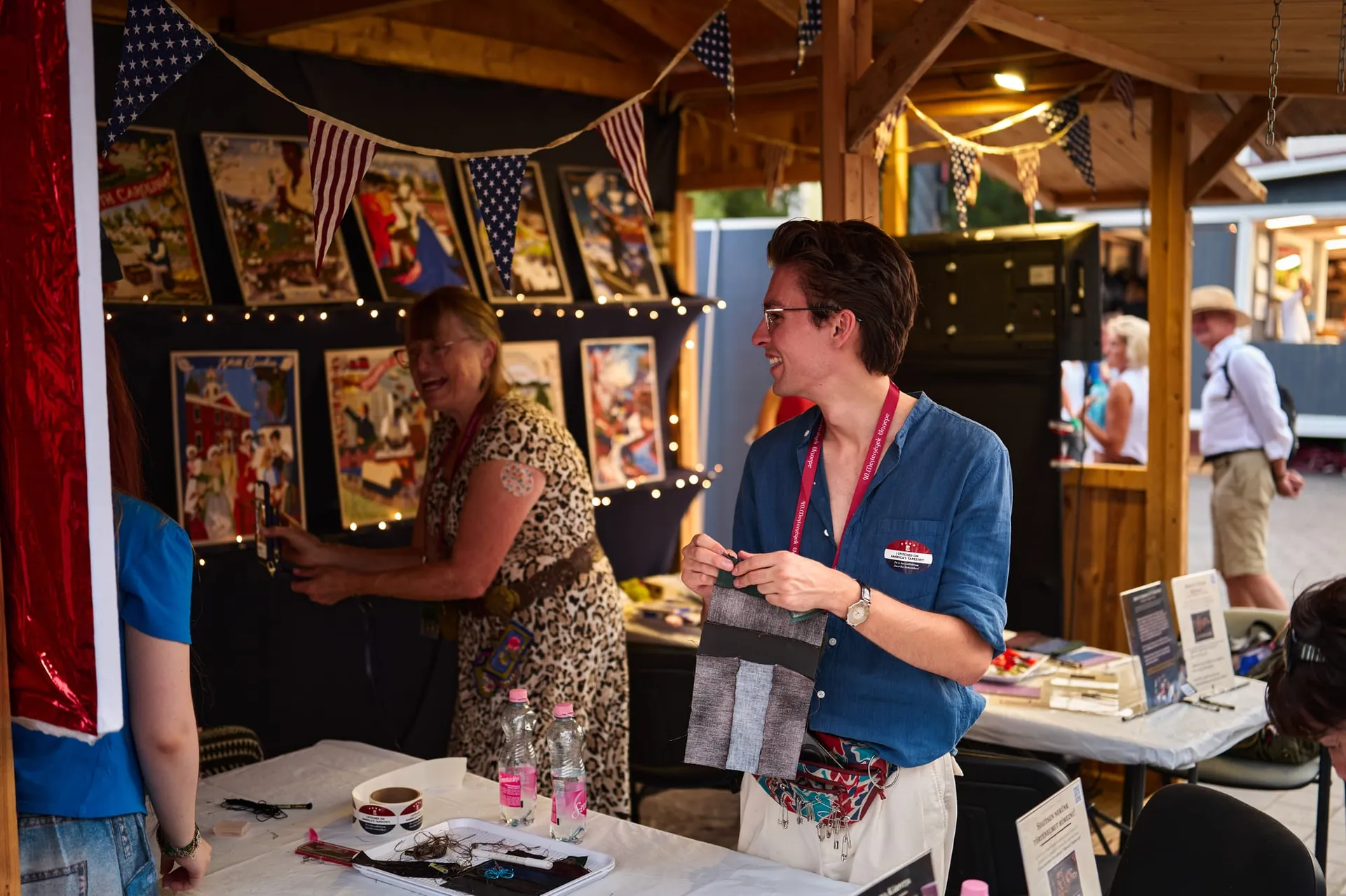 Two visitors at the booth