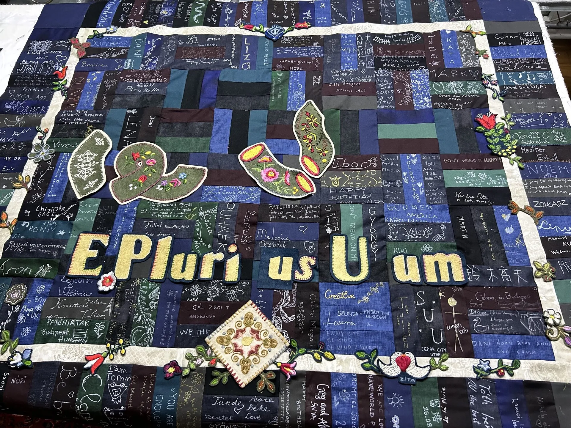 The panel taking shape, with the floral border begun